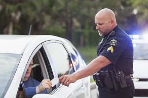 cop giving man a ticket