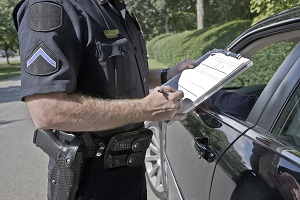cop writing a ticket